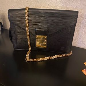 SOLD!!’ Louis Vuitton Epi clutch